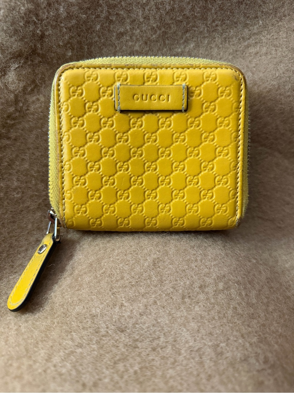 Gucci Vibrant Medium Yellow Embossed Leather Compact Wallet.